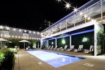 Outdoor pool, free cabanas, pool umbrellas at Hotel Ella