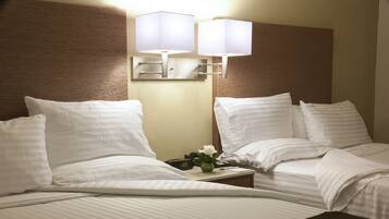 Habitación estándar | Ropa de cama de alta calidad, camas Select Comfort y escritorio