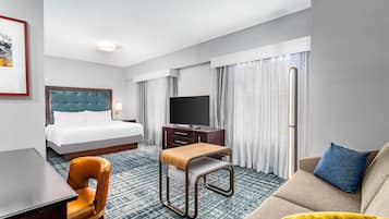 Studio Suite, 1 King Bed, Non Smoking | Living area | 50-inch TV with cable channels, Netflix, streaming services