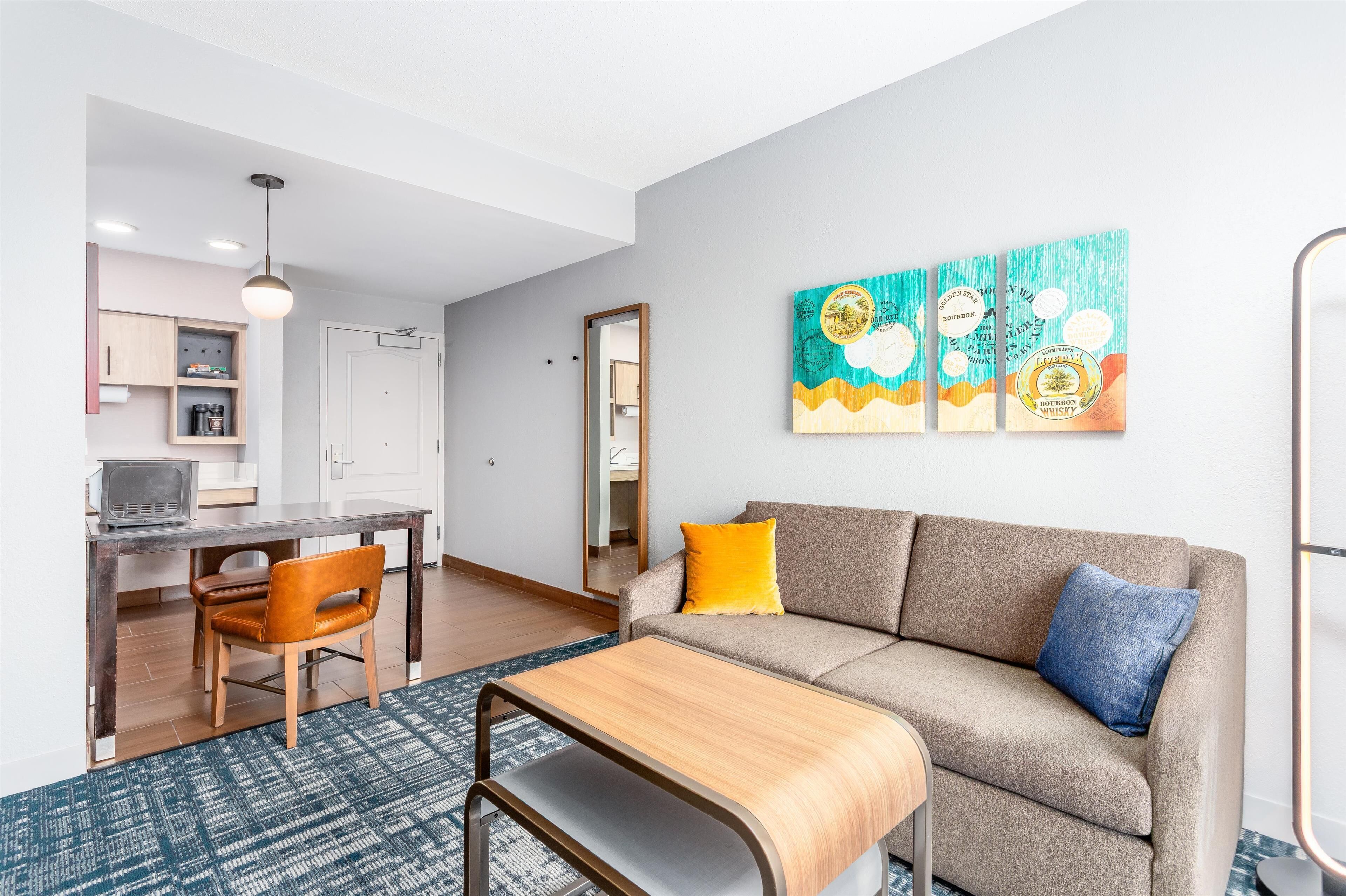 suite, 1 king bed, accessible, bathtub | living area | 50-inch tv with cable channels, netflix, streaming services