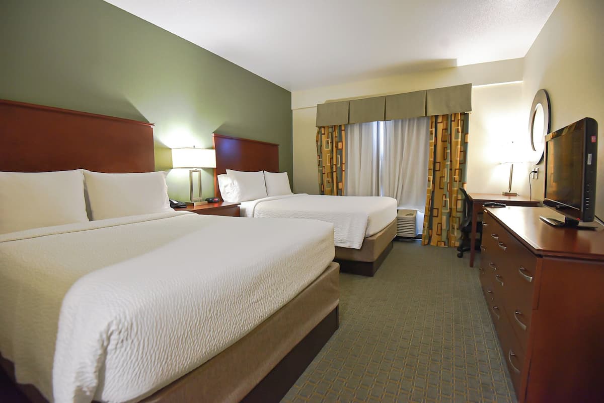 Standard Room, 2 Queen Beds | Down comforters, desk, laptop workspace, blackout drapes