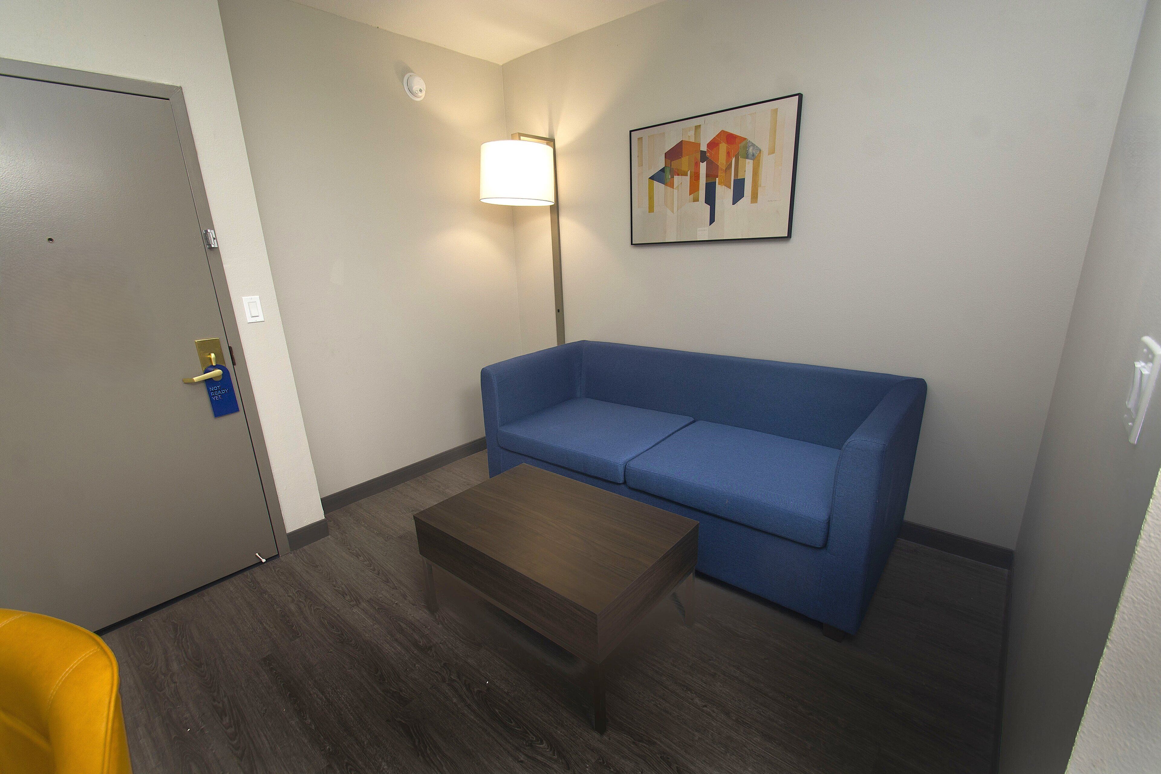 Suite, 2 Queen Beds | Down comforters, desk, laptop workspace, blackout drapes