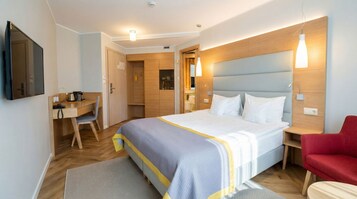 Deluxe Oda | Minibar, odada kasa, masa, dizüstü bilgisayar çalışma alanı 
