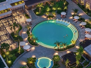Outdoor pool, open 6:00 AM to 9:00 PM, free cabanas, sun loungers