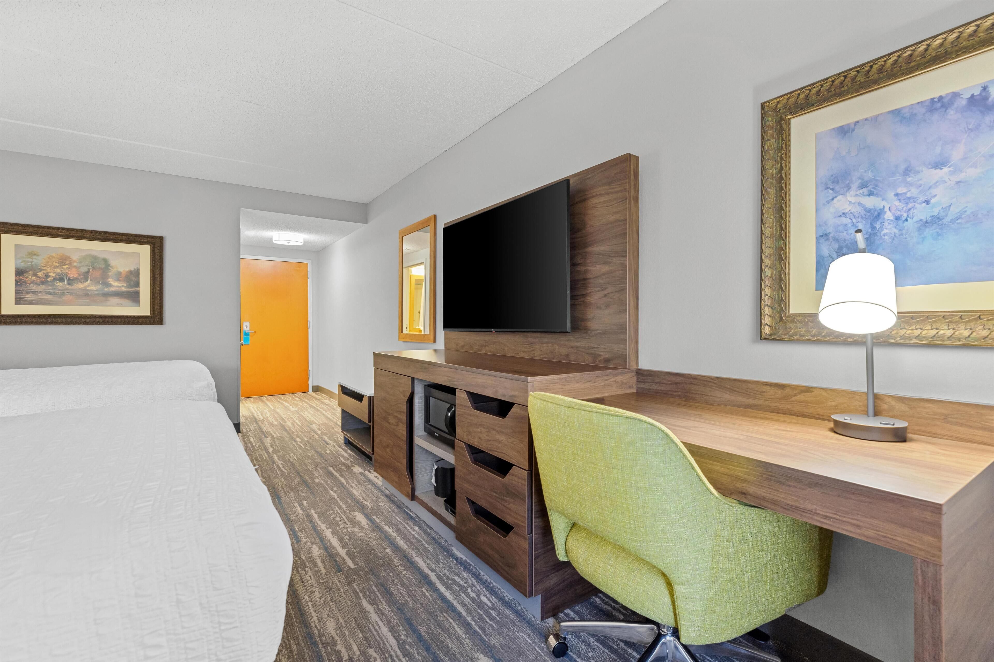 2 queensize bedden | Een kluis op de kamer, verduisterende gordijnen