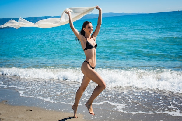 Beach nearby, white sand, beach cabanas, sun loungers