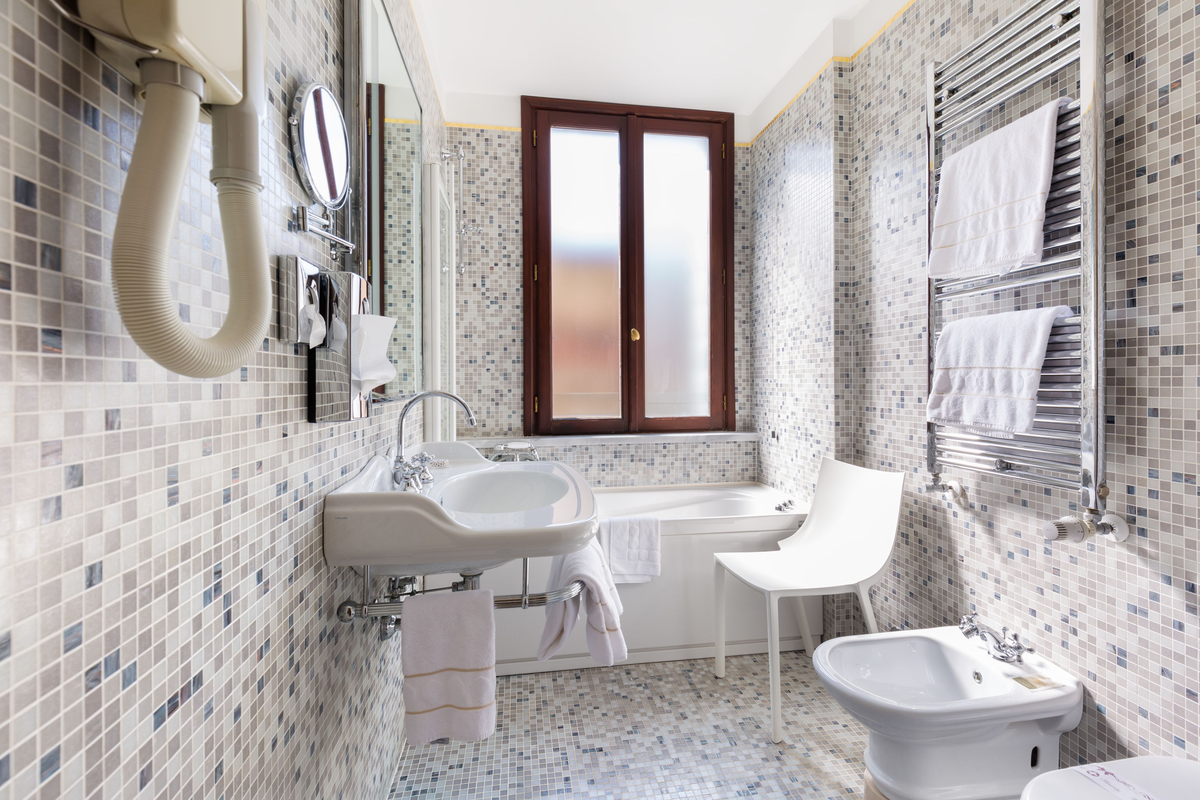 rainfall showerhead, hair dryer, bidet, towels