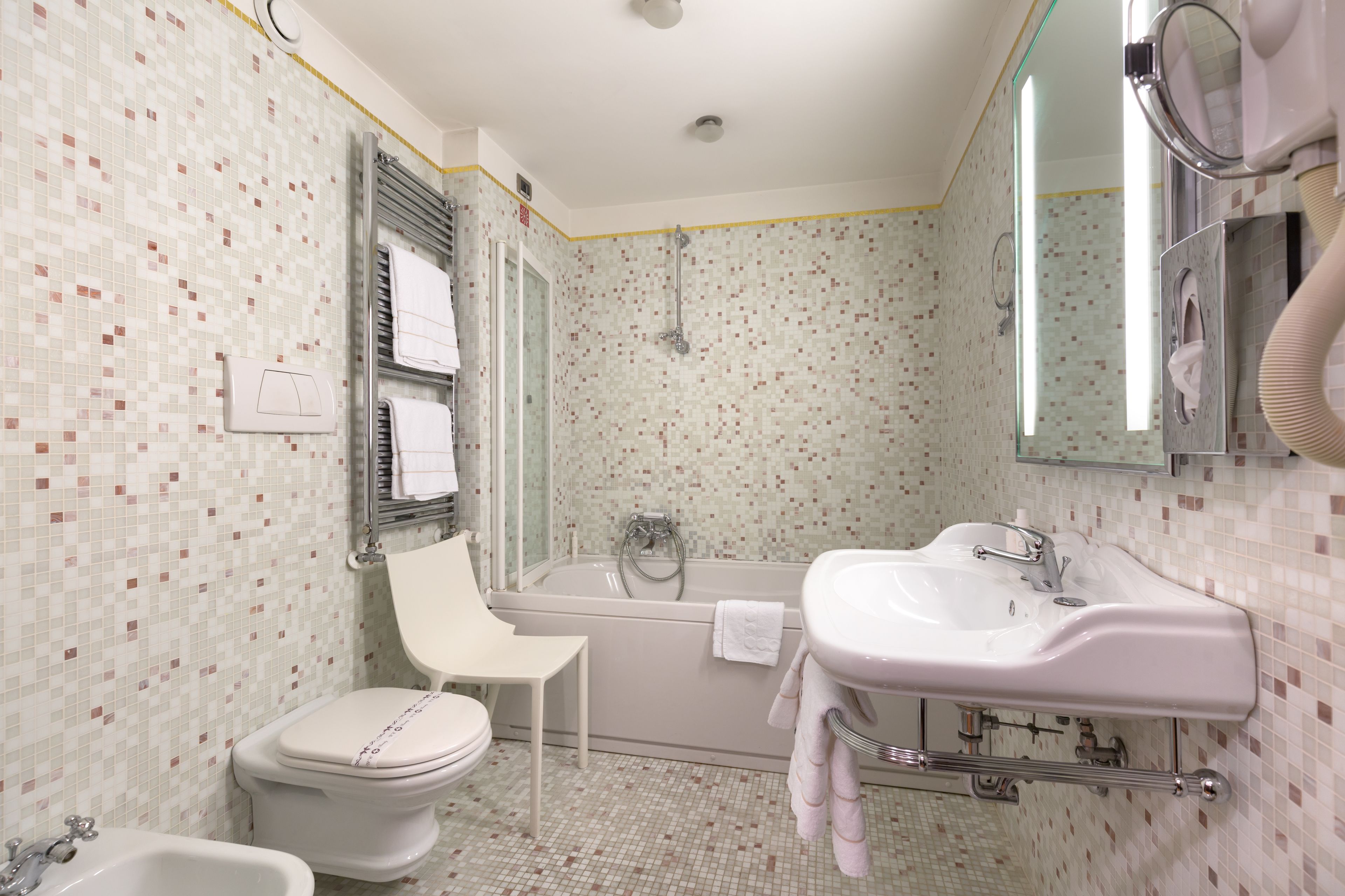 rainfall showerhead, hair dryer, bidet, towels