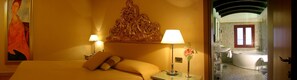 Hypo-allergenic bedding, down comforters, minibar, in-room safe