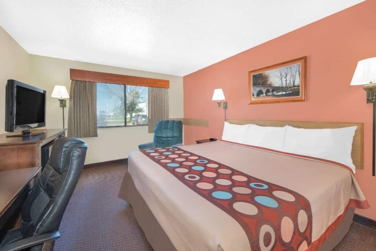 Desk, blackout drapes, iron/ironing board, free cribs/infant beds