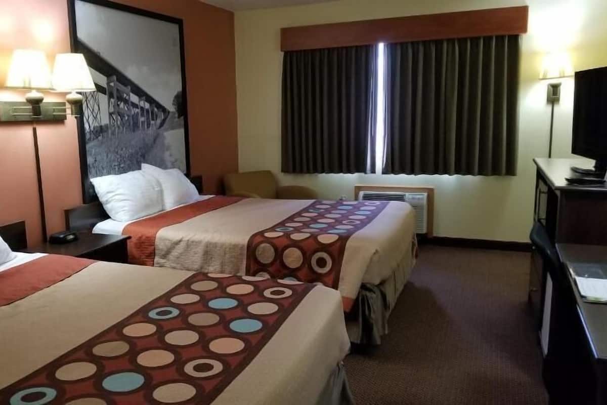 Desk, blackout drapes, iron/ironing board, free cribs/infant beds