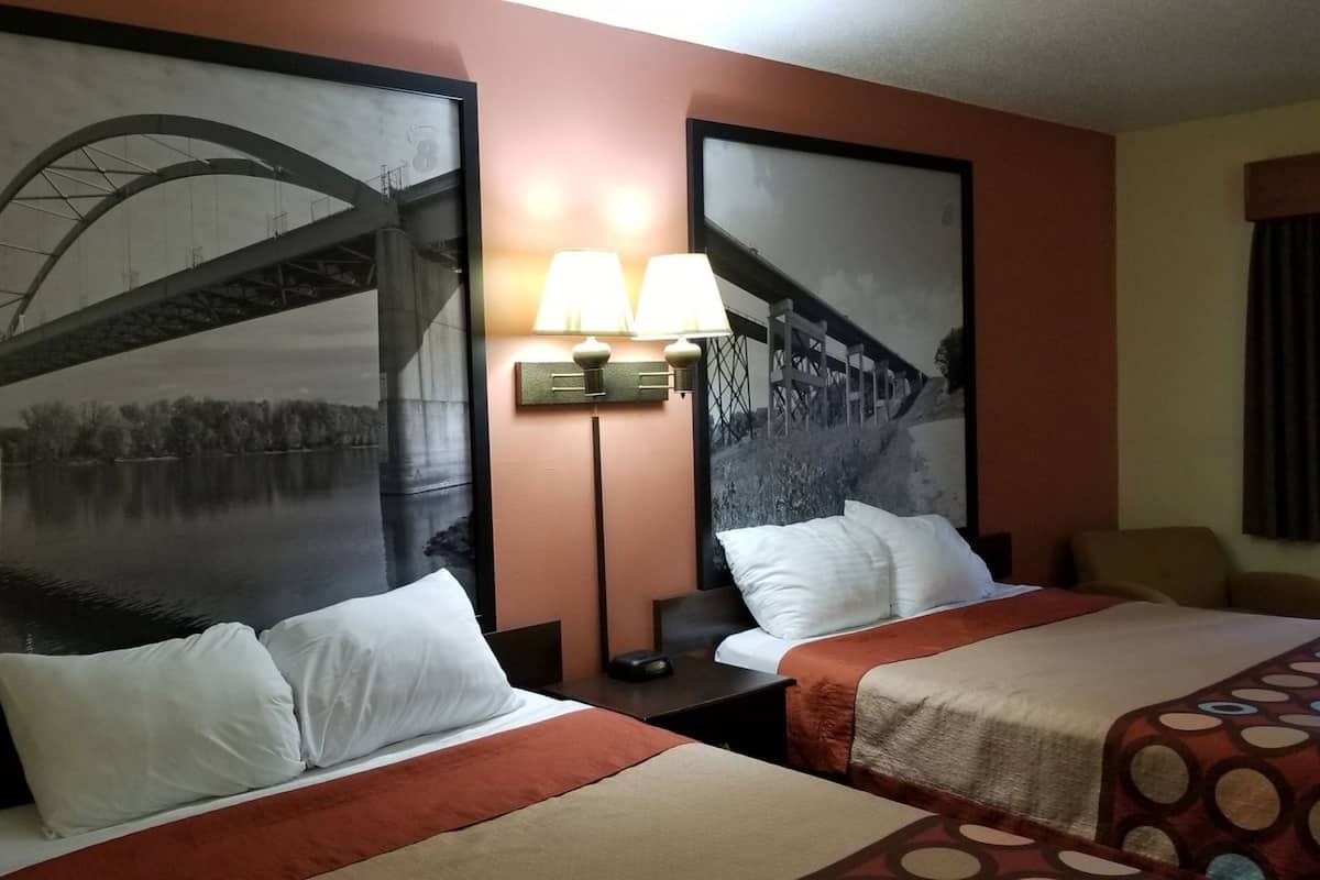 Desk, blackout drapes, iron/ironing board, free cribs/infant beds