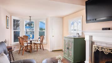 32-inch flat-screen TV with cable channels, TV