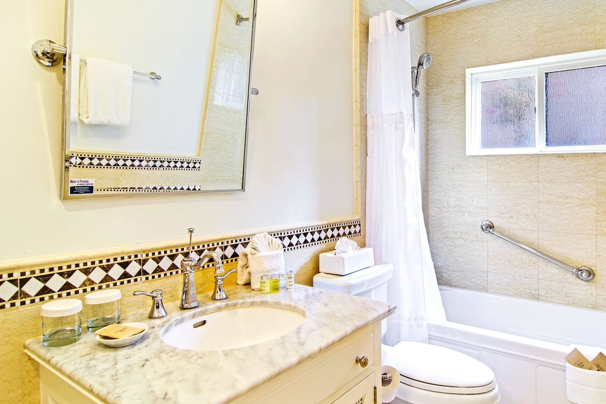 shower, hair dryer, bathrobes, towels