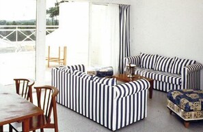 Standard Apartment, 1 Bedroom (8 Person) | Living area | 50-cm flat-screen TV with digital channels, TV