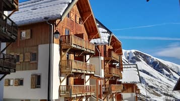 Enjoy breathtaking mountain views from the multiple balconies of this traditional chalet.
