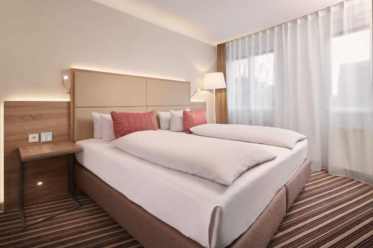 1 Schlafzimmer, hochwertige Bettwaren, kostenlose Minibar, Zimmersafe