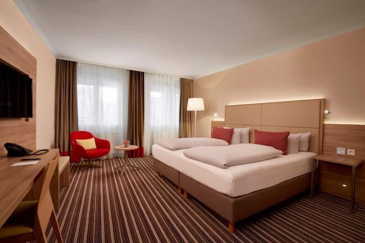 1 Schlafzimmer, hochwertige Bettwaren, kostenlose Minibar, Zimmersafe