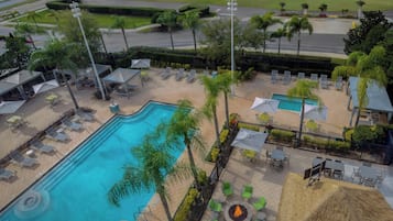 Outdoor pool, open 8:00 AM to 10:00 PM, free pool cabanas, pool loungers