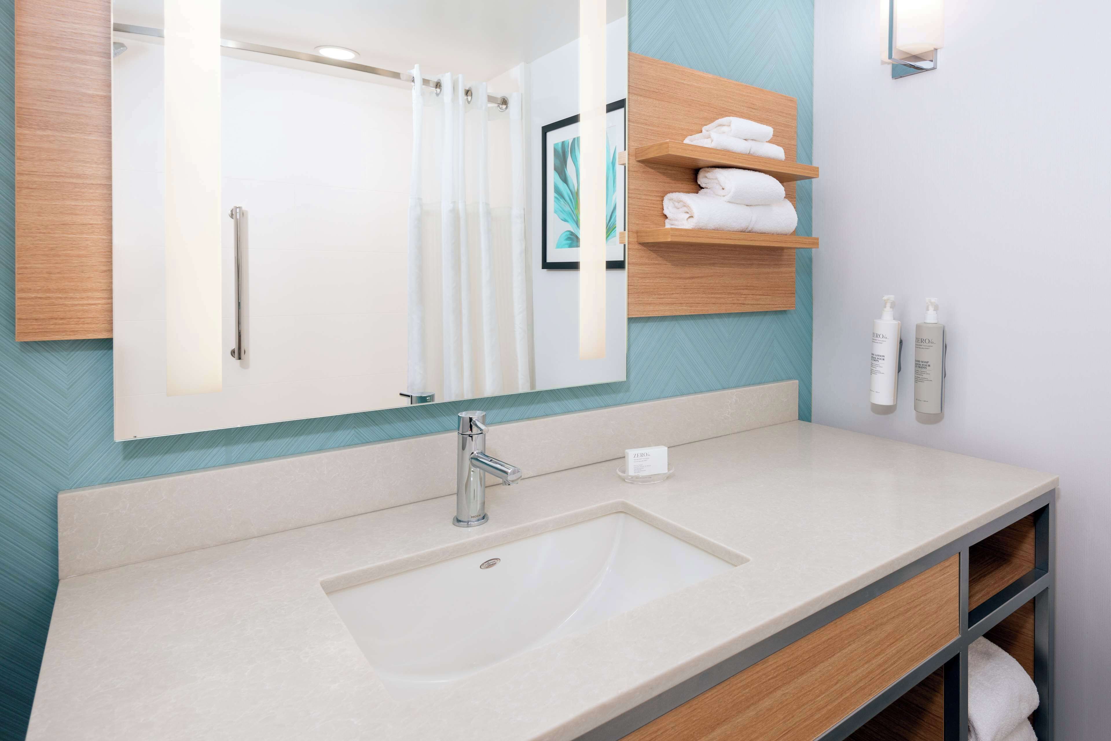 room, 2 queen beds | bathroom | free toiletries, hair dryer, towels, soap