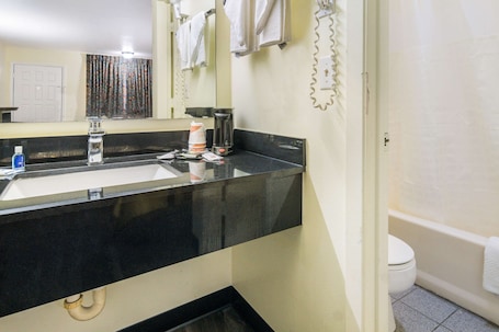 Standard Room, 2 Queen Beds, Smoking | Bathroom | Bathtub, hair dryer, towels. Rodeway Inn Ranger I-20