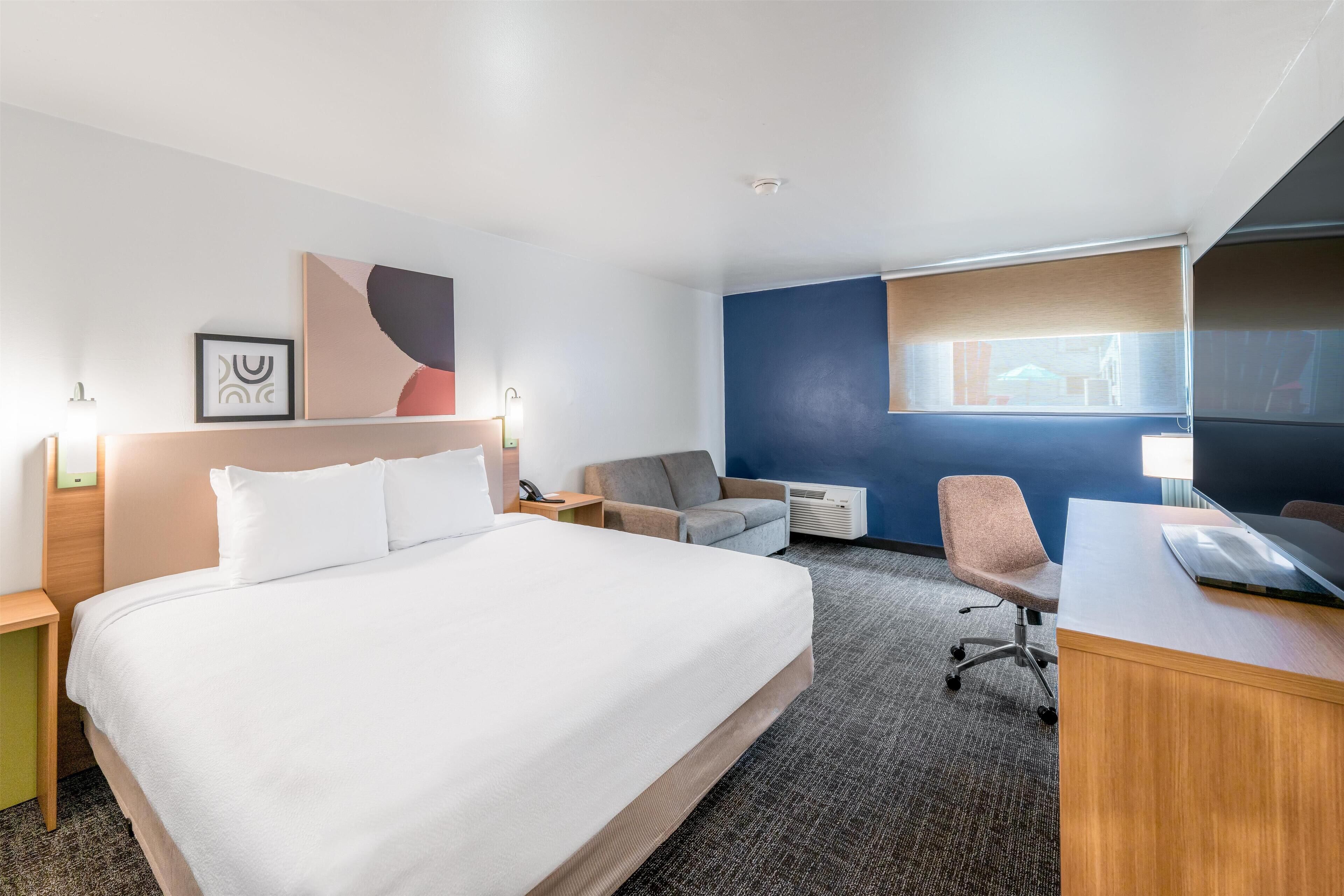 In-room safe, desk, blackout curtains, iron/ironing board