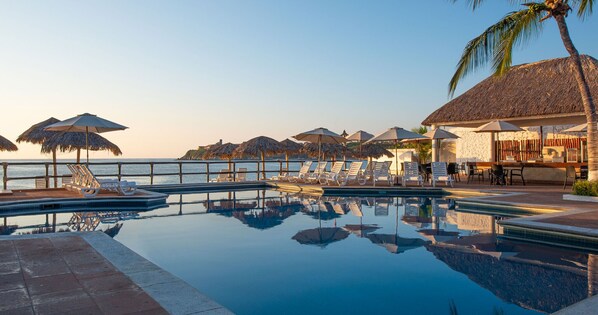2 outdoor pools, pool umbrellas, pool loungers