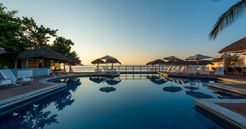 2 outdoor pools, pool umbrellas, sun loungers