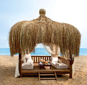 Private beach, free beach cabanas, beach umbrellas, beach towels