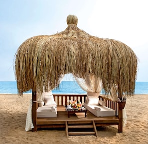 Private beach, free beach cabanas, beach umbrellas, beach towels