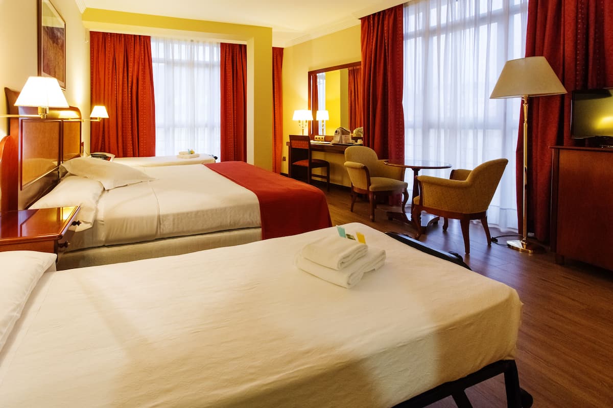 family room, city view (2 adults + 2 children) | minibar, in-room safe, desk, blackout curtains