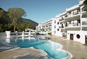 2 outdoor pools, pool umbrellas, sun loungers