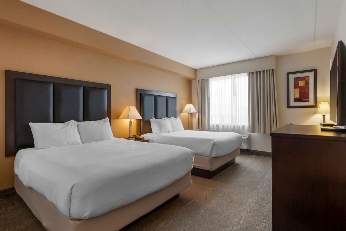 Hypo-allergenic bedding, pillowtop beds, desk, laptop workspace