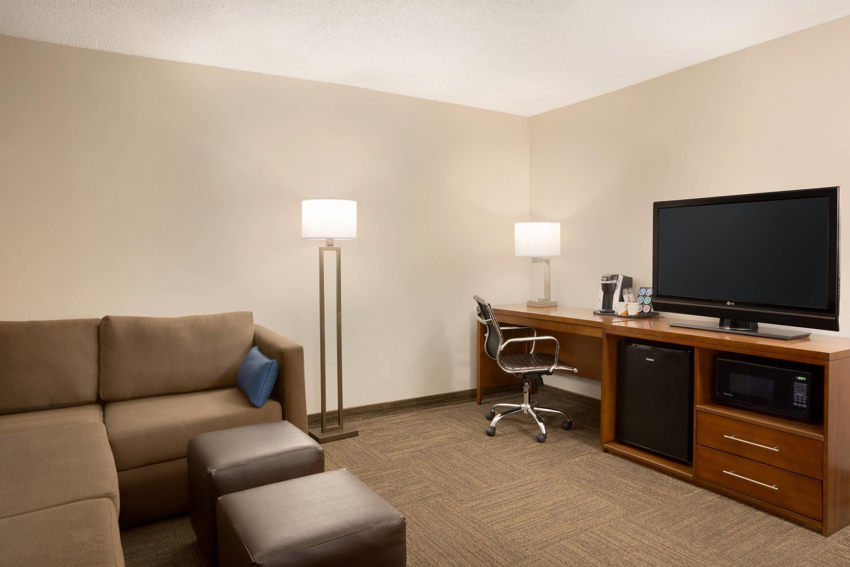Suite, 2 Queen Beds, Sofa Bed | Premium bedding, down comforters, desk, laptop workspace