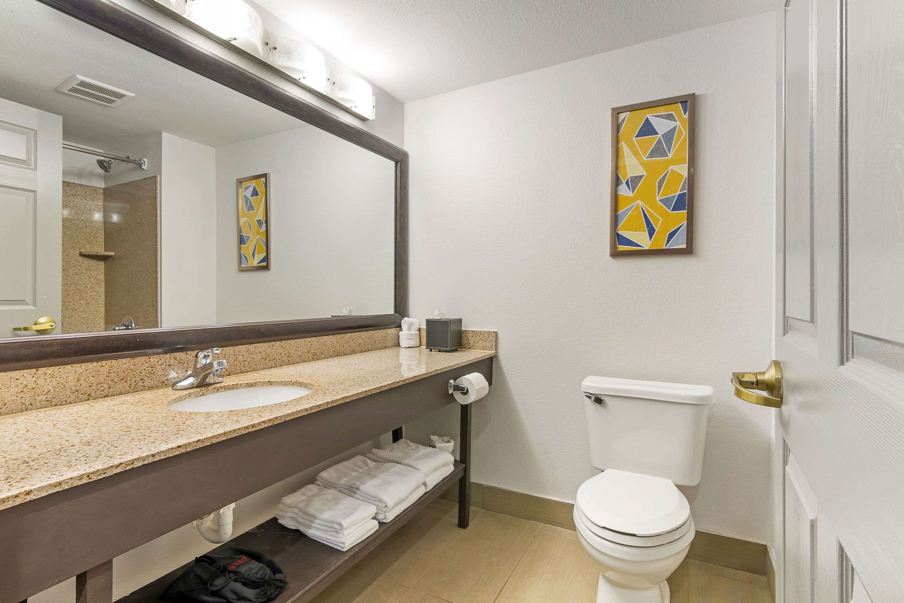 desk, laptop workspace, blackout curtains, iron/ironing board