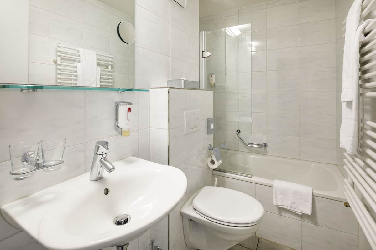 free toiletries, hair dryer, slippers, towels