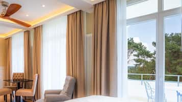 Suite Deluxe, balcón, frente al océano | 1 habitación y ropa de cama hipoalergénica