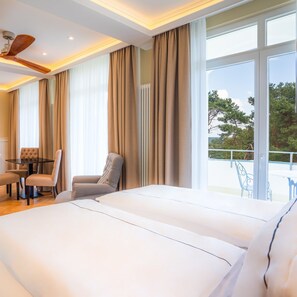 Deluxe Suite, Balcony, Oceanfront | Premium bedding, in-room safe, blackout curtains, soundproofing