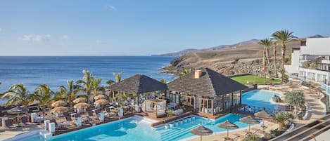 4 outdoor pools, open 9:00 AM to 8:00 PM, pool umbrellas, sun loungers