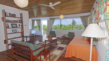 Departamento, 1 habitación, vista a la playa | Sala de estar