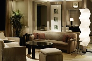 Premium bedding, down comforters, minibar, in-room safe