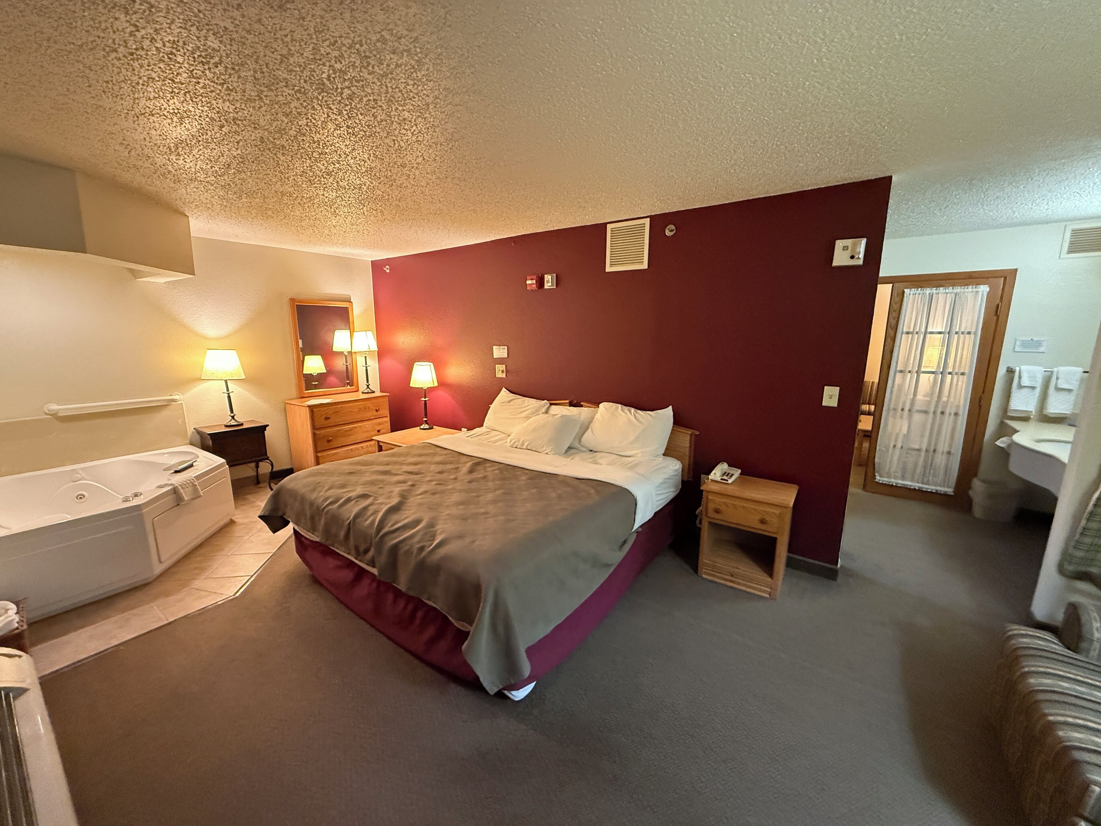 suite, 1 king bed with sofa bed, non smoking | desk, laptop workspace, iron/ironing board, free wifi