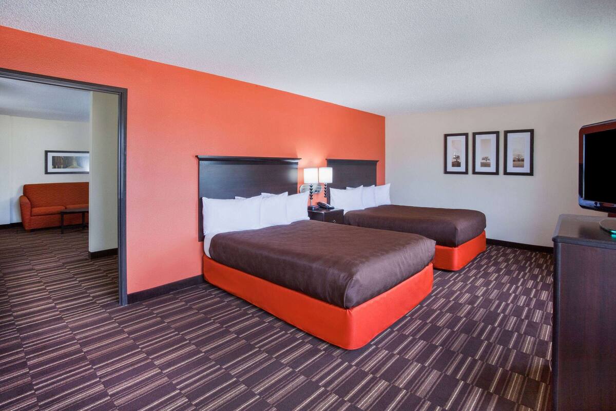 suite, 2 queen beds, non smoking | desk, iron/ironing board, free cots/infant beds, rollaway beds