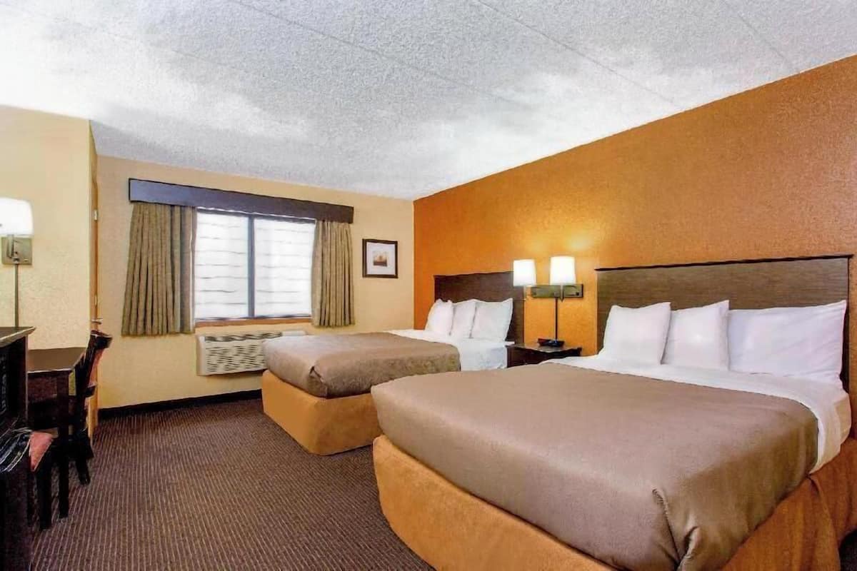 Individually furnished, desk, laptop workspace, blackout drapes