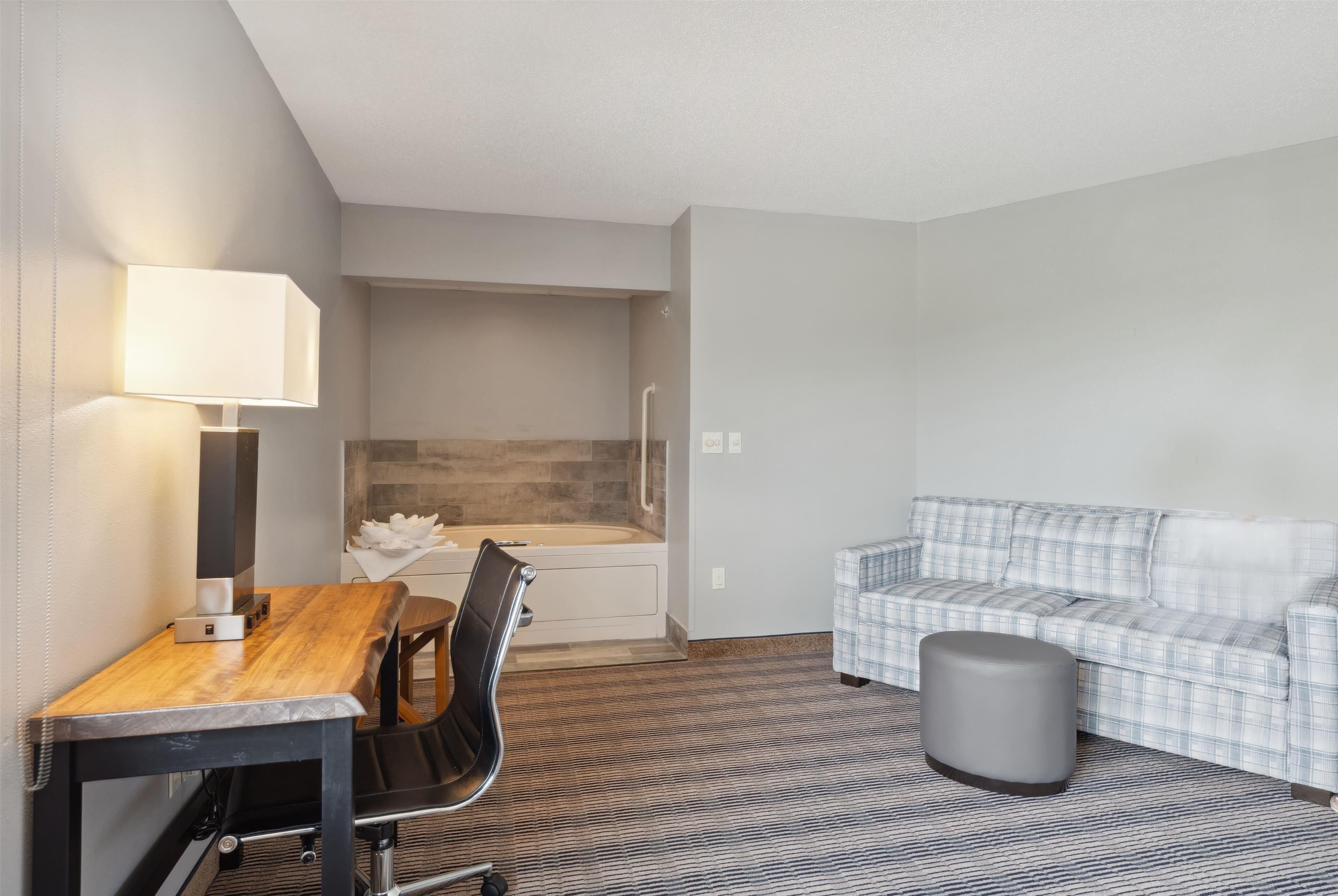 room, 1 king bed, non smoking, jetted tub | desk, iron/ironing board, cots/infant beds, rollaway beds