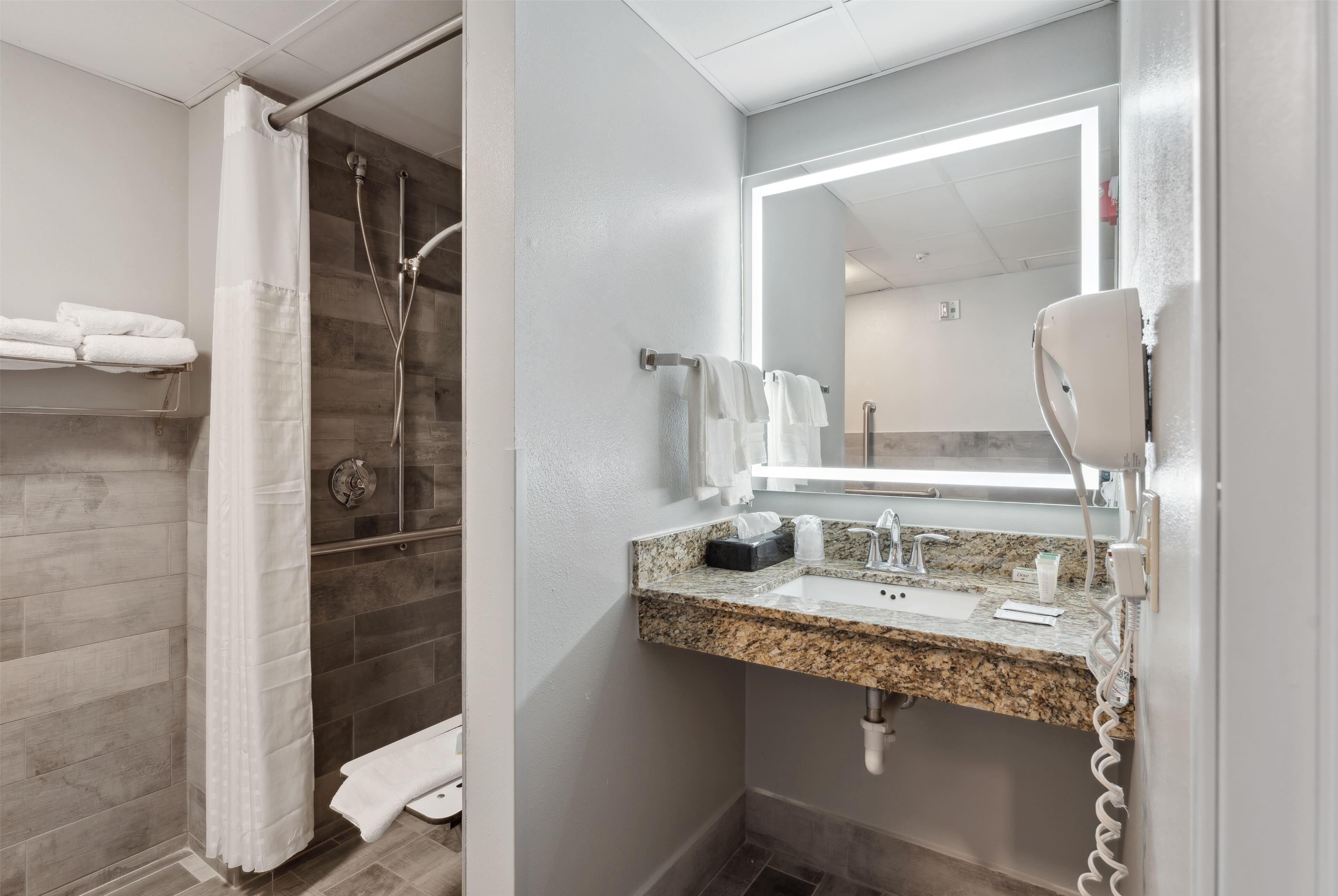 combined shower/bathtub, free toiletries, hair dryer, towels