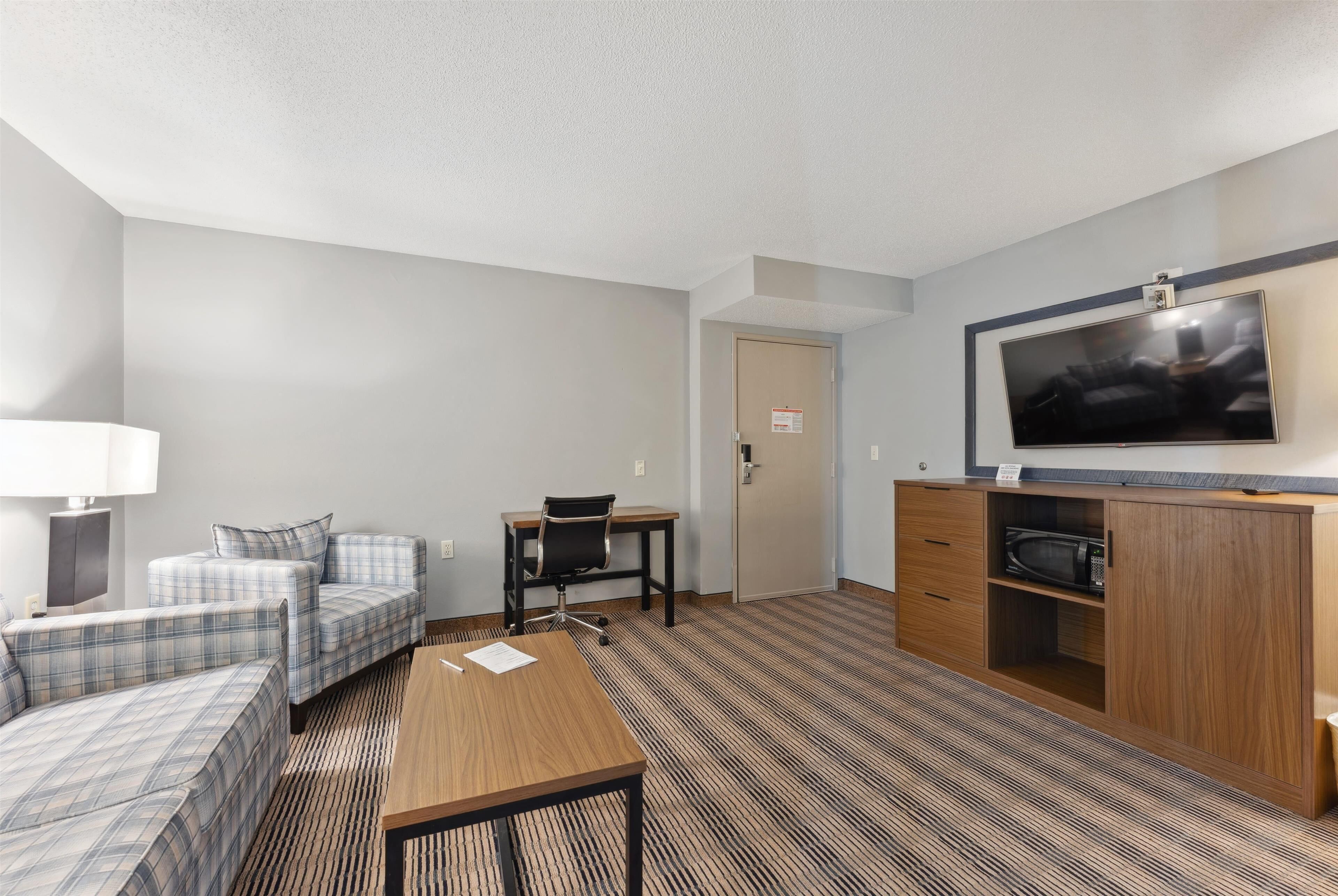 suite, 1 bedroom, non smoking | desk, iron/ironing board, cots/infant beds, rollaway beds