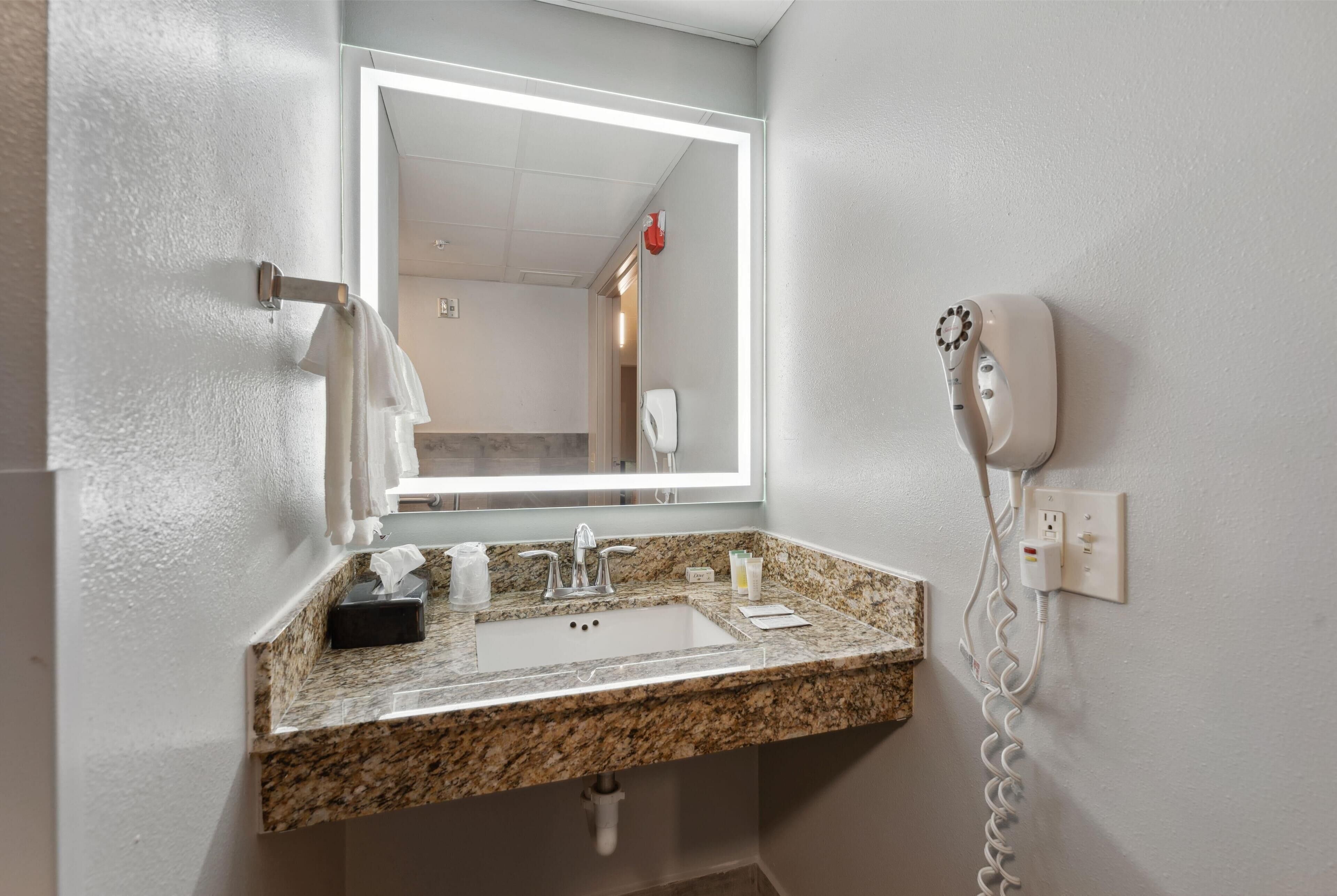 combined shower/bathtub, free toiletries, hair dryer, towels