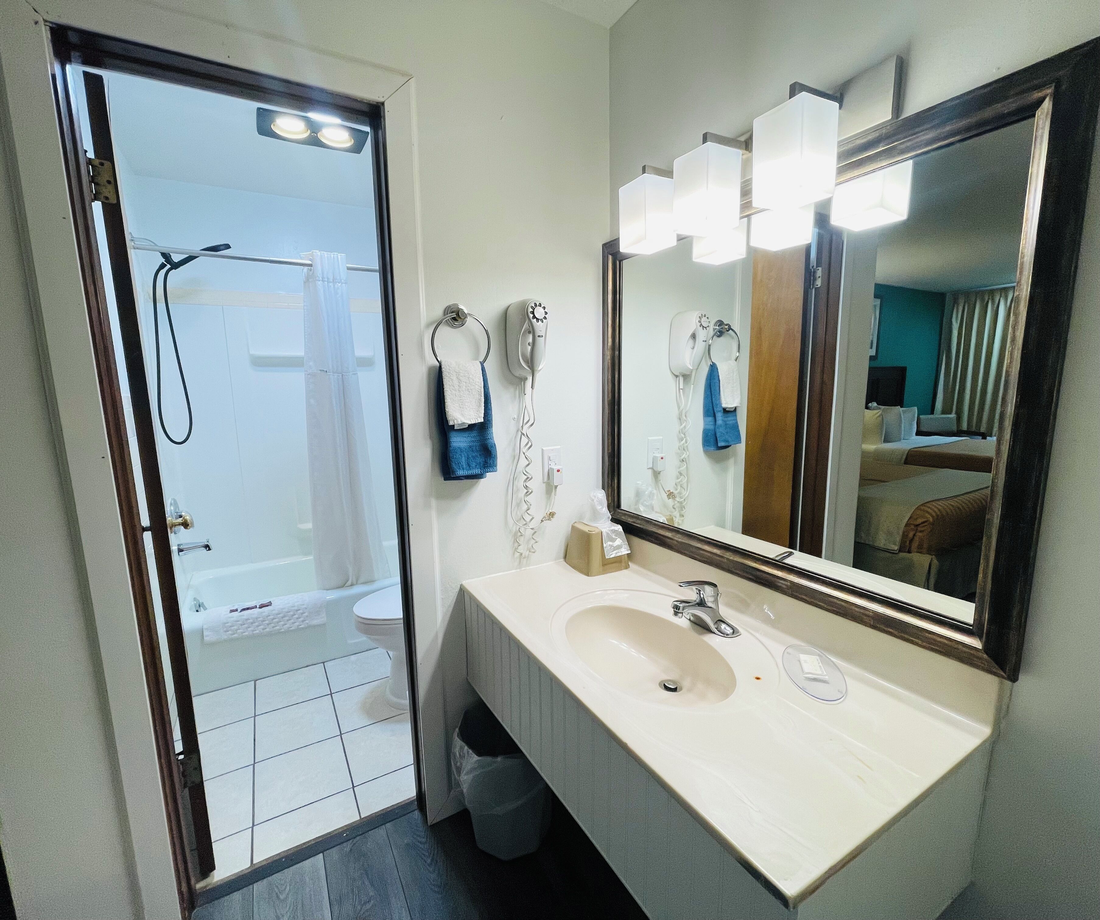 Standard Double Room, 2 Double Beds | Bathroom | Hair dryer, towels