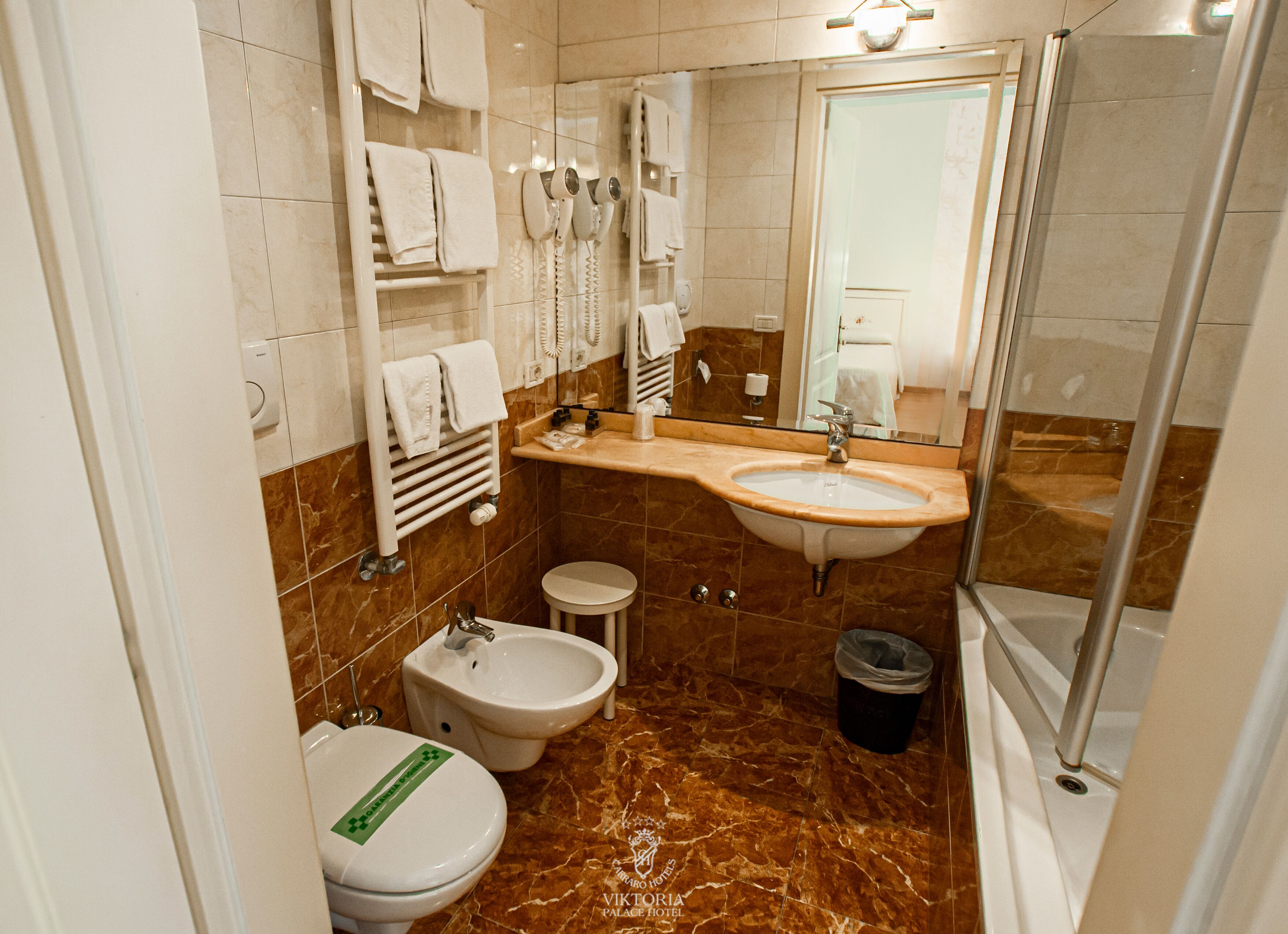 triple room | bathroom | rainfall showerhead, hair dryer, bidet, towels
